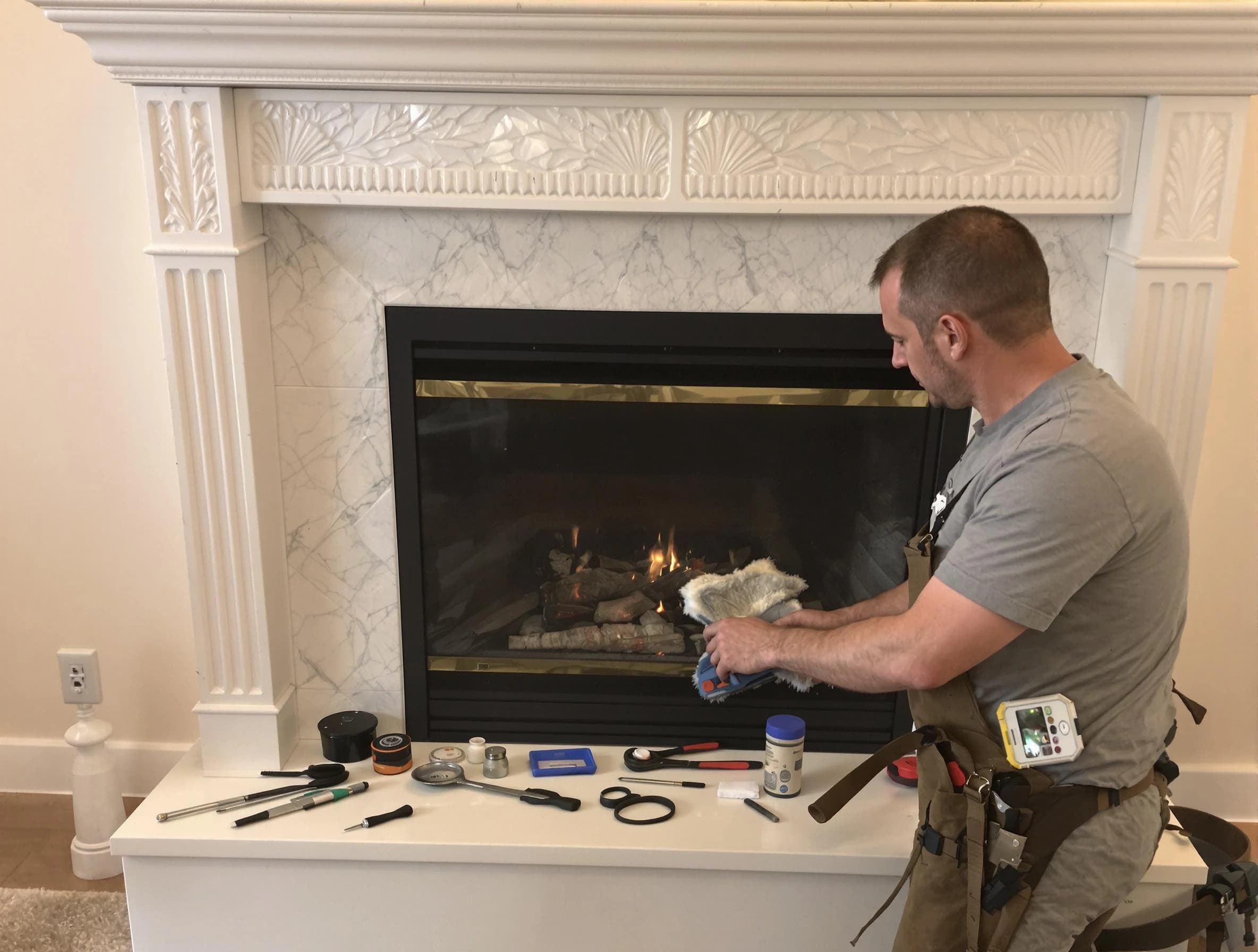 Bluffdale Chimney Sweep performing fireplace maintenance in Bluffdale, UT